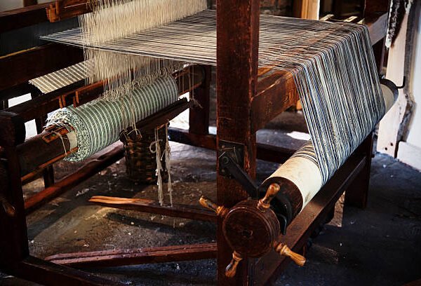 What was the most important role textiles played in the industrial revolution?